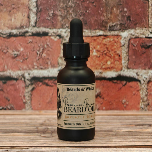 Beards & Wicks' Barber's Blend Premium Beard Oil - 1 oz black glass dropper bottle with kraft paper label, handcrafted in Romeoville, IL with organic oils including jojoba, argan, and broccoli seed oil for beard nourishment and conditioning