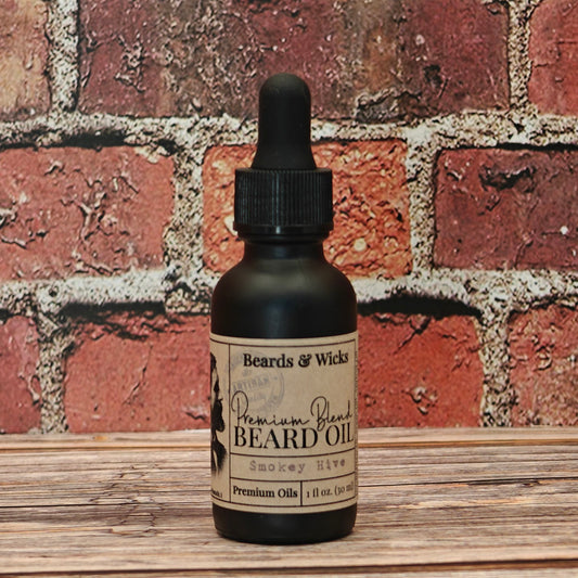 Beards & Wicks' Smokey Hive Premium Beard Oil - 1 oz black glass dropper bottle with kraft paper label, handcrafted in Romeoville, IL with organic oils including jojoba, argan, and broccoli seed oil for beard nourishment and conditioning